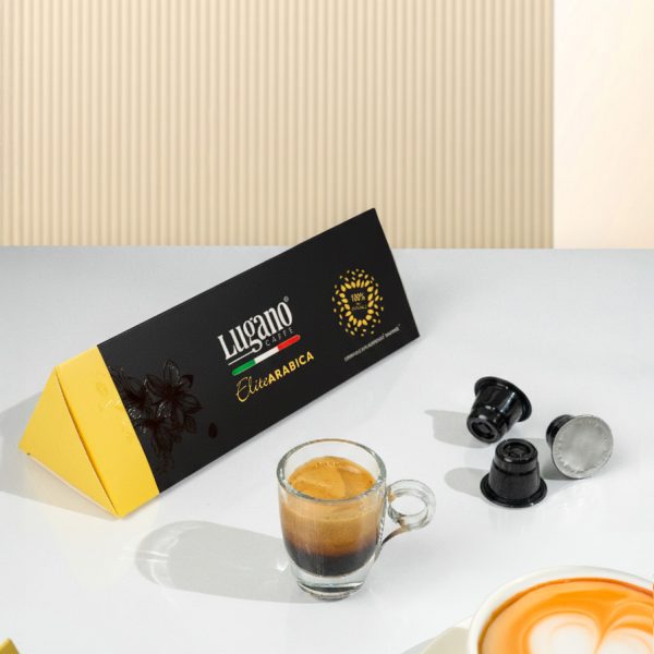 Lugano Caffè Elite Arabica Espresso Capsule Triangular Pack 10 Pcs wih an espresso cup in a set