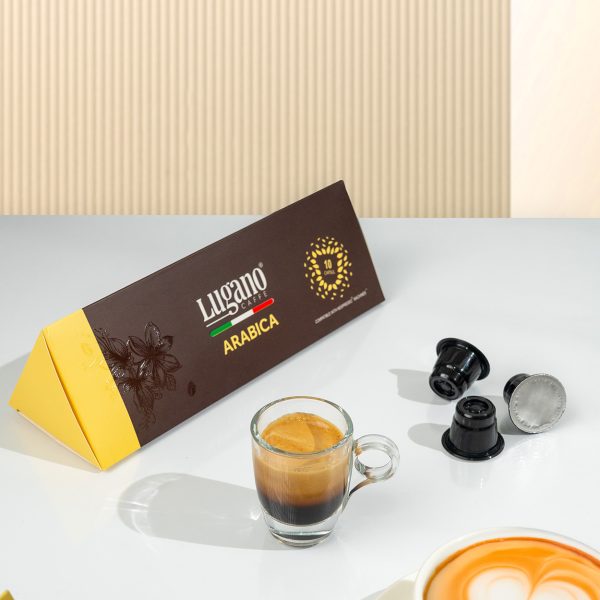 Lugano Caffè Arabica Espresso Capsule Triangular Pack 10 Pcs with an espresso cup in a set