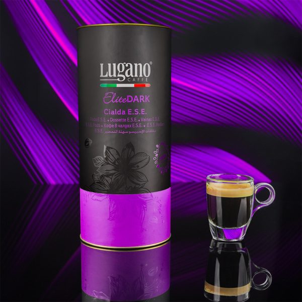 Lugano Caffè Elite Dark Espresso Pod 18 pcs cylinder pack with a cup in a studio set