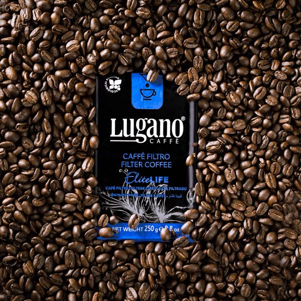 Lugano Caffè Elite Life Filter Coffee 250 Gr Vacuum Pack surrounded by coffee beans 1250x1250
